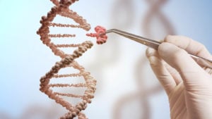Gene editing stocks: a concept image of a hand holding a pair of tweezers that is pulling a section off of a dna strand
