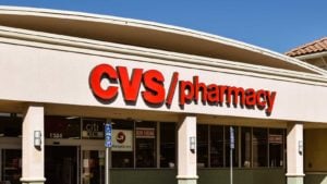 The logo for CVS Pharmacy is displayed on a retail storefront.
