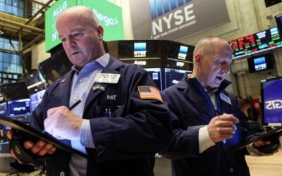Wall Street closes higher as worries ease around Fed, Russian default