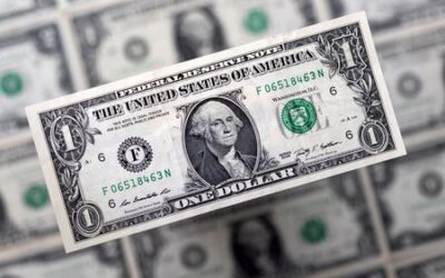 Dollar slips, but posts best month since 2015